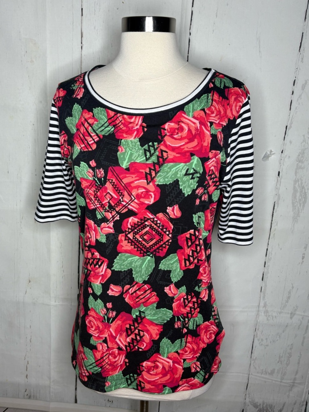LuLaRoe Black Floral Tee with Red Roses and Striped Sleeves
